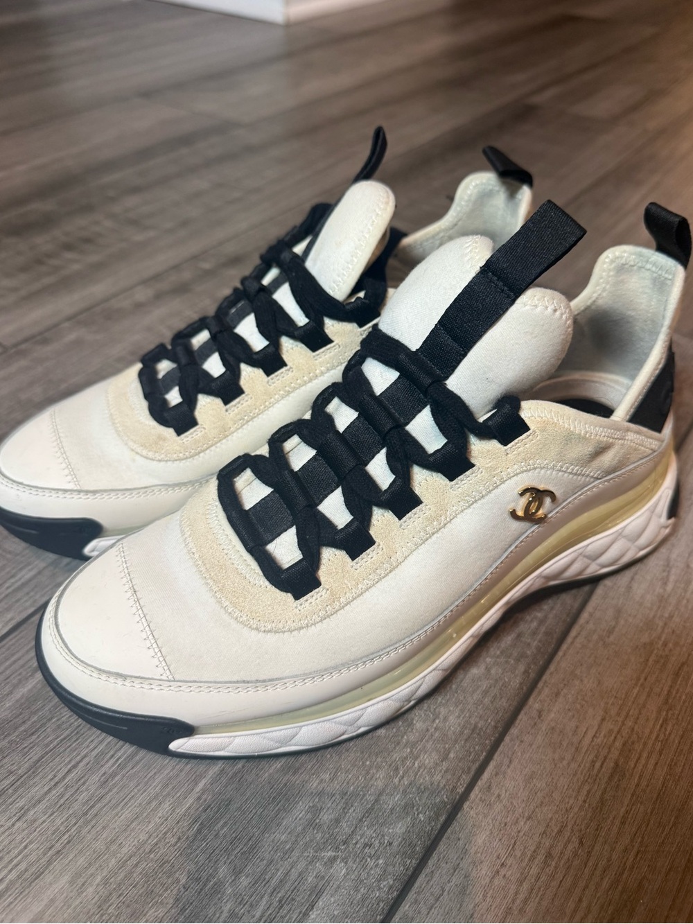 CHANEL Cream and Black Logo Runner Sneakers